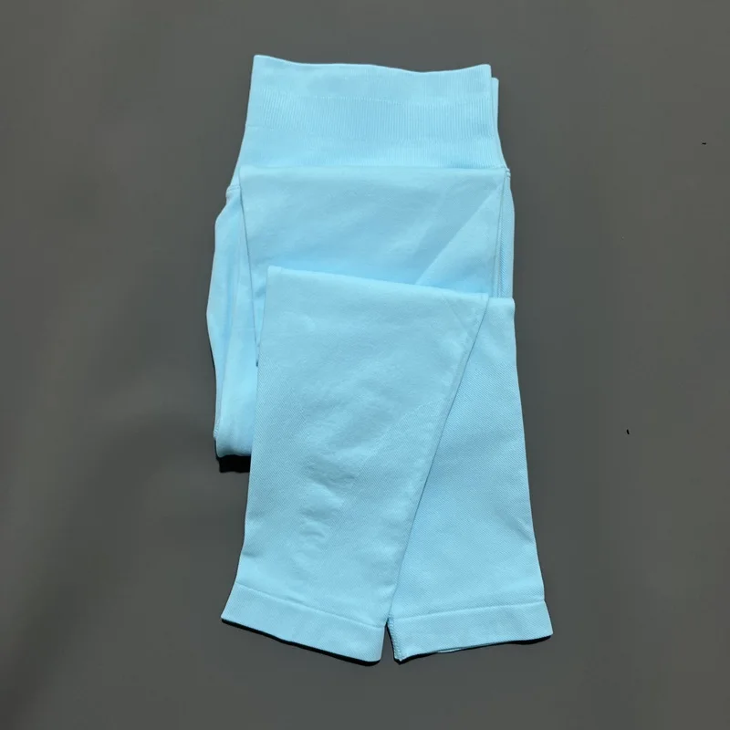Bezszwowe legginsy sportowe damskie z efektem Push Up prążkowane Ciemny niebieski