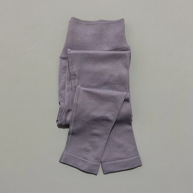 Bezszwowe legginsy sportowe damskie z efektem Push Up prążkowane Złoto