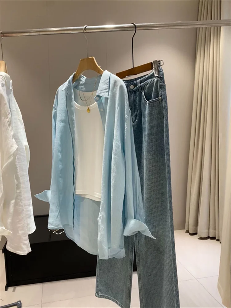 Biała lniana koszula oversize z długim rękawem — elegancka i lekka Niebieski
