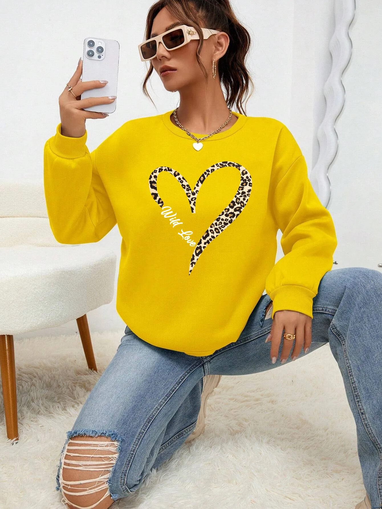 Bluza plus size w panterkę z okrągłym dekoltem Czarny