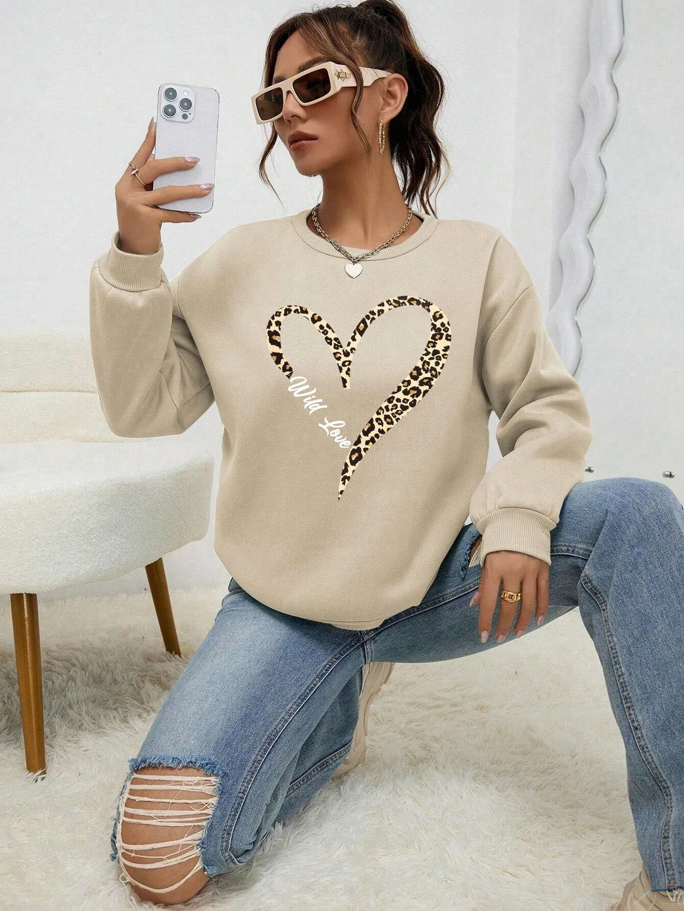 Bluza plus size w panterkę z okrągłym dekoltem Niebieski