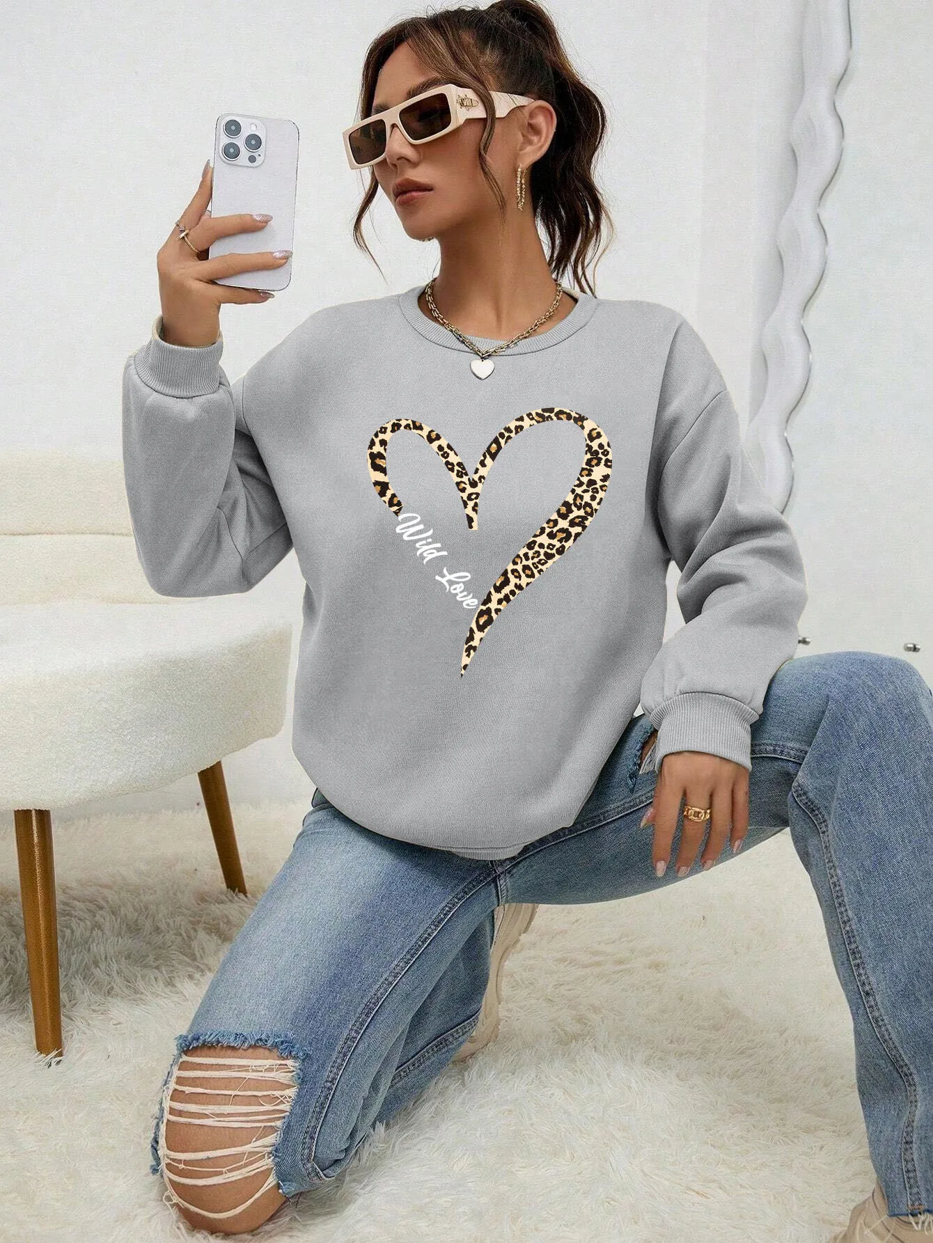 Bluza plus size w panterkę z okrągłym dekoltem Zielony
