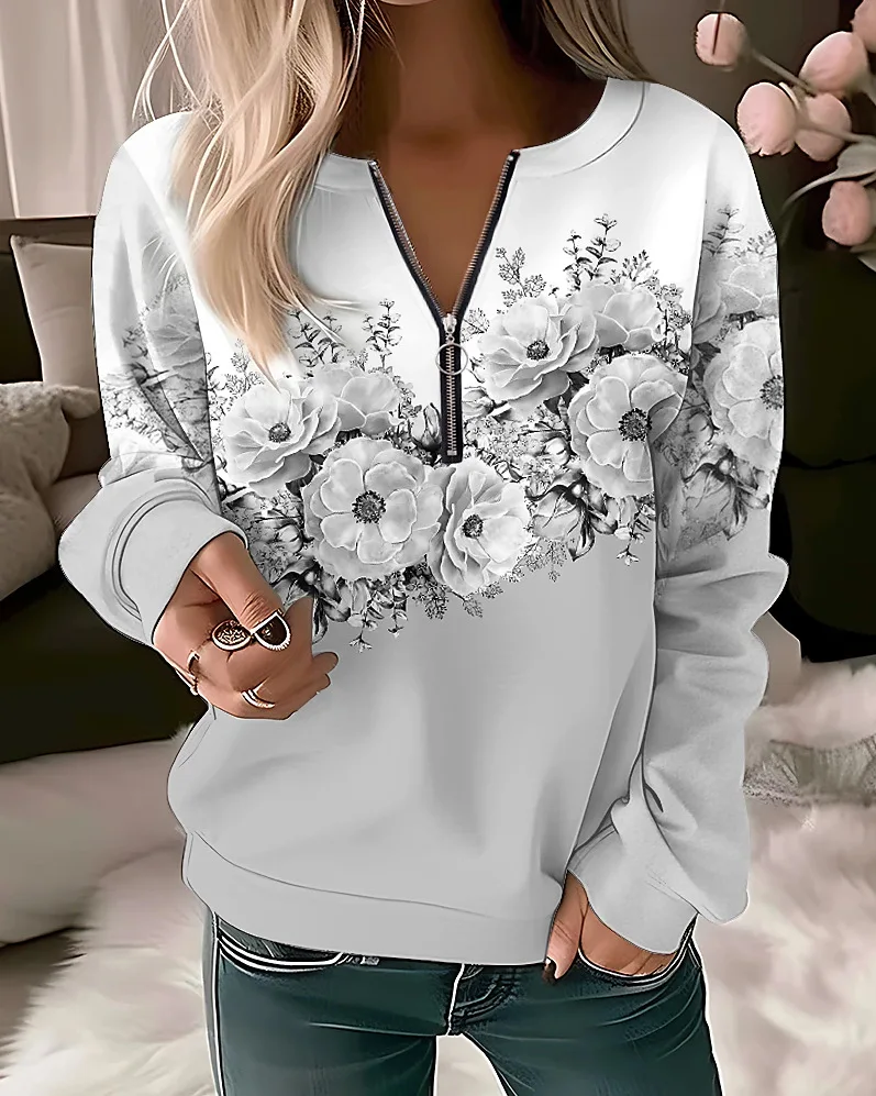 Damska bluza z kapturem oversize w kwiaty na zamek Niebieski