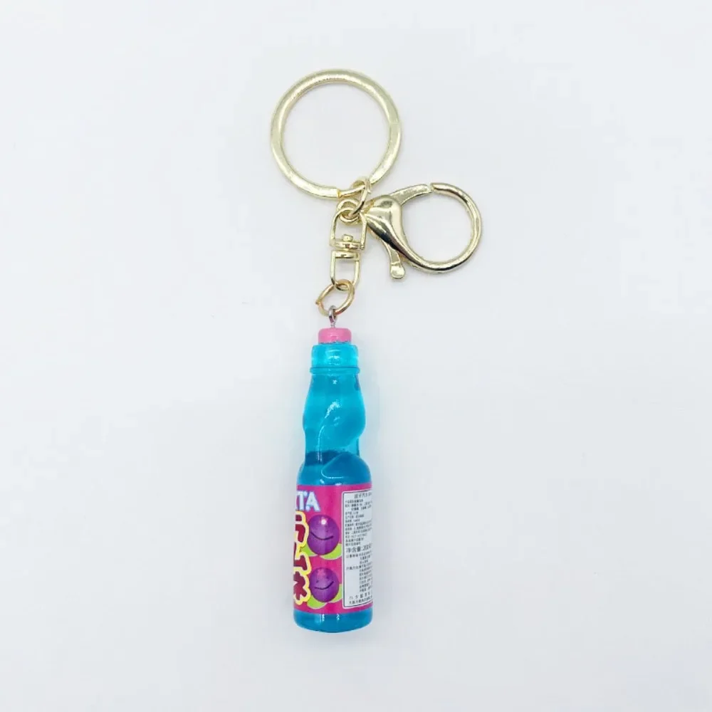 Breloczek japońska sodówka Ramune — miniaturowy wisiorek do torby Szary