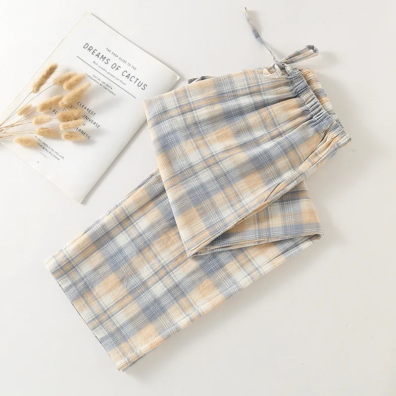 Damskie spodnie piżamowe w kratę plus size z elastyczną talią Błękitny