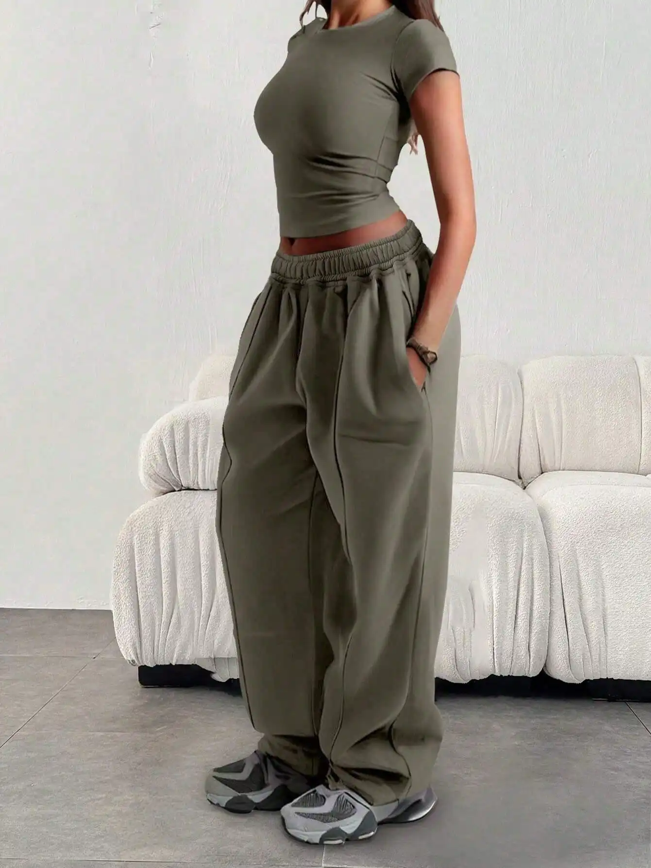 Damskie spodnie sportowe plus size z szerokimi nogawkami Zielony