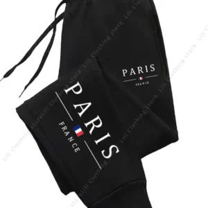 Dresowe spodnie joggery damskie z nadrukiem Paris Czarny