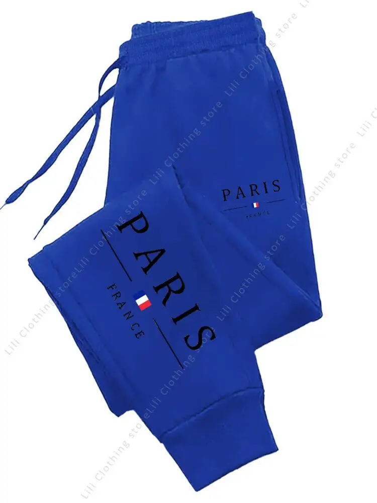 Dresowe spodnie joggery damskie z nadrukiem Paris Blue01