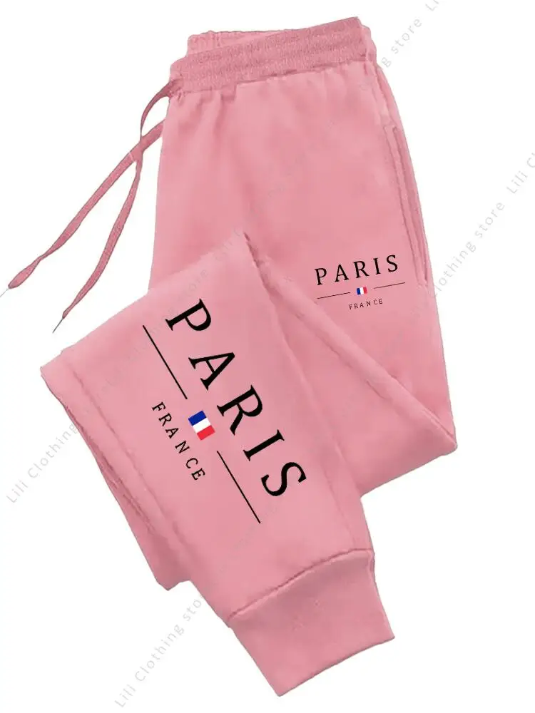 Dresowe spodnie joggery damskie z nadrukiem Paris Pink01