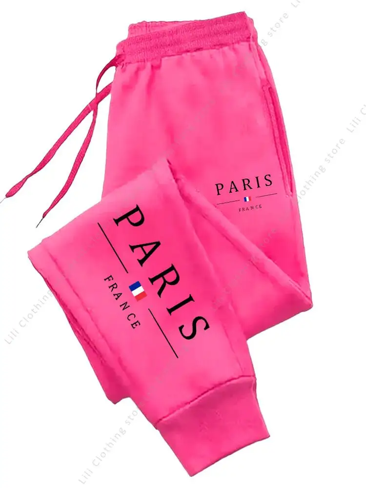 Dresowe spodnie joggery damskie z nadrukiem Paris Rose01