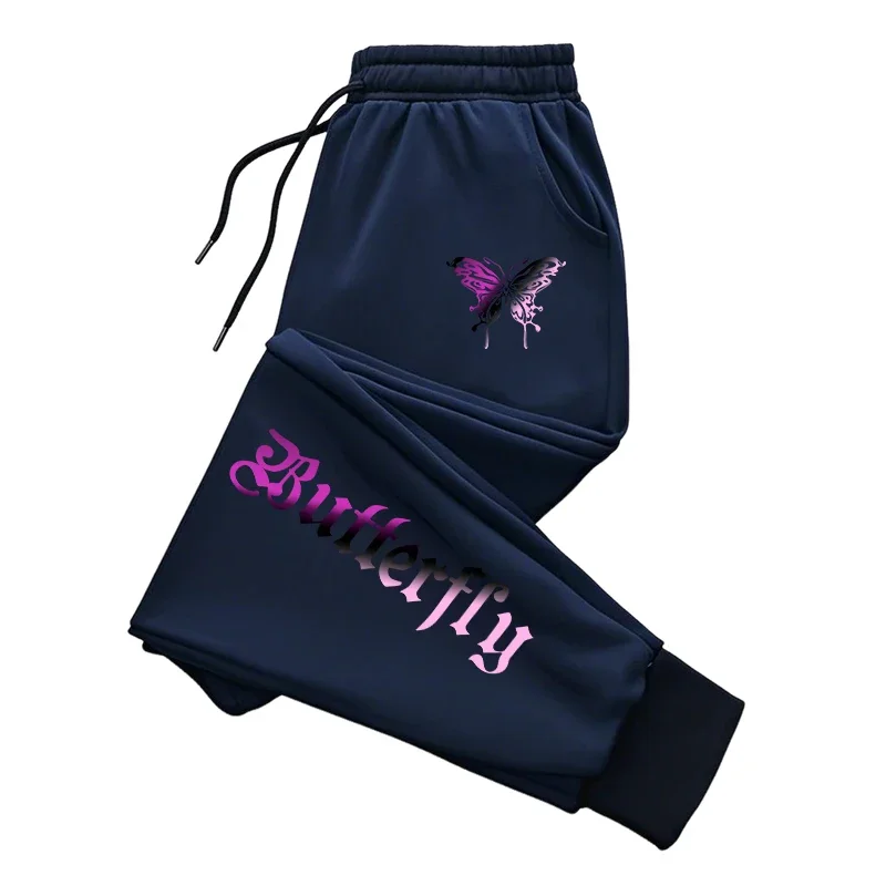 Dresowe spodnie joggery z literowym nadrukiem — streetwear na co dzień Granatowy