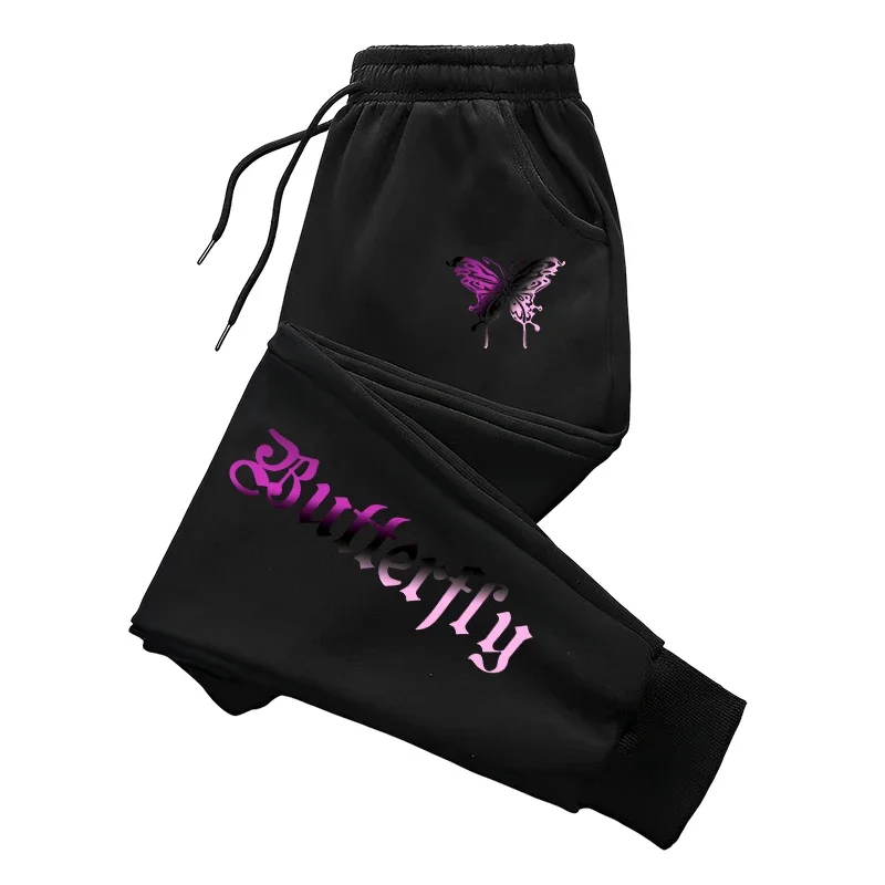 Dresowe spodnie joggery z literowym nadrukiem — streetwear na co dzień Czarny