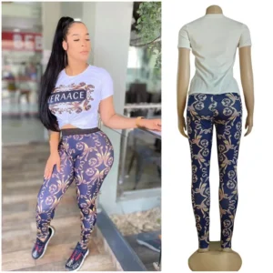 Dwuczęściowy damski komplet crop top i spodnie ołówkowe slim fit Biały