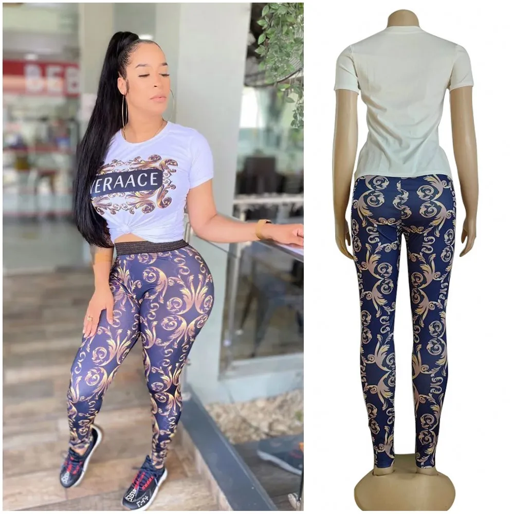 Dwuczęściowy damski komplet crop top i spodnie ołówkowe slim fit Biały
