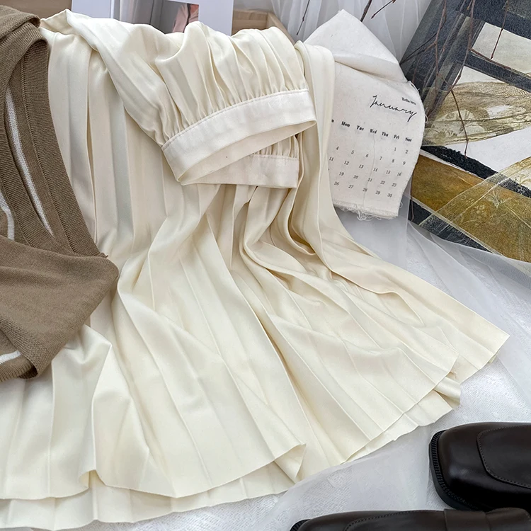 Elegancka plisowana spódnica midi z wysokim stanem Beżowy