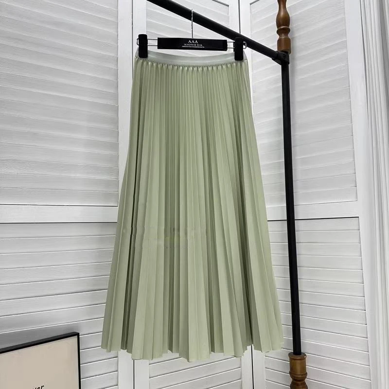 Elegancka plisowana spódnica midi z wysokim stanem Błękitny