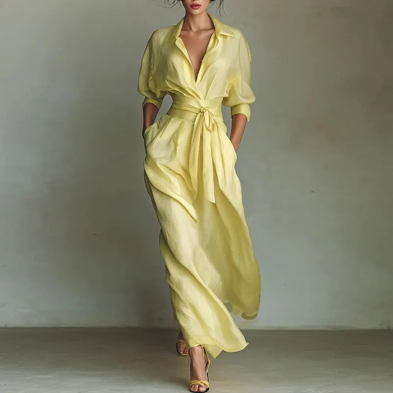 Elegancka sukienka maxi boho z koronkowym wiązaniem i kieszeniami żółty