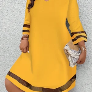 Elegancka sukienka plus size na co dzień — luźny nowoczesny krój Złoto