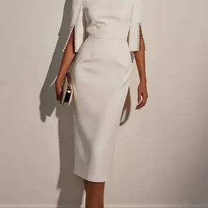 Elegancka sukienka wieczorowa zdobiona koralikami Biały