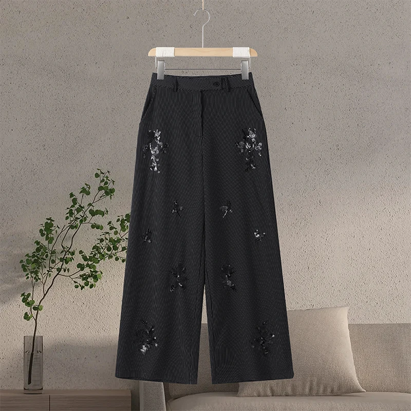 Elegancki zestaw z cekinowego żakietu i szerokich spodni Only pants