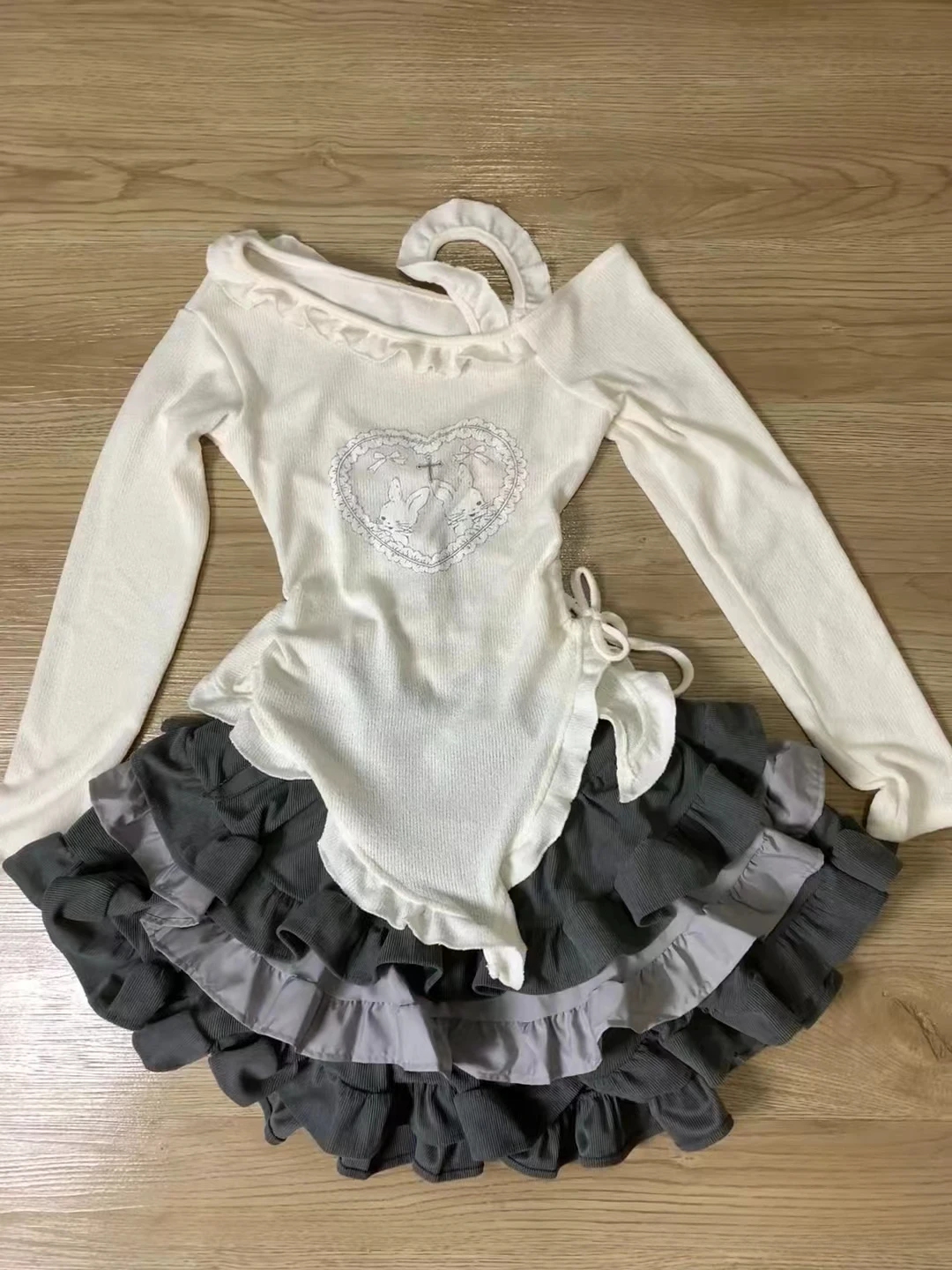 Japoński komplet preppy — bluzka z kokardą i mini spódniczka w kratę Niebieski