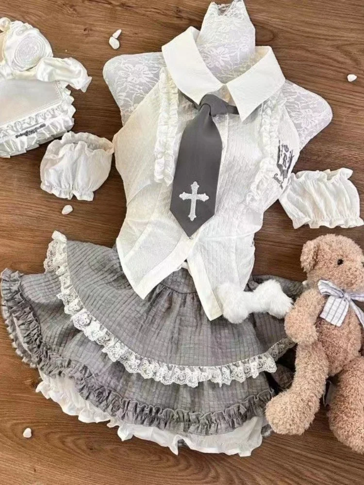 Japoński komplet preppy — bluzka z kokardą i mini spódniczka w kratę Szary