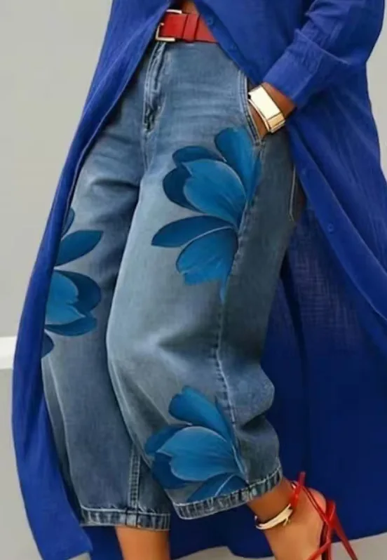 Jeansowe spodnie w kwiaty z szerokimi nogawkami — boho streetwear Niebieski