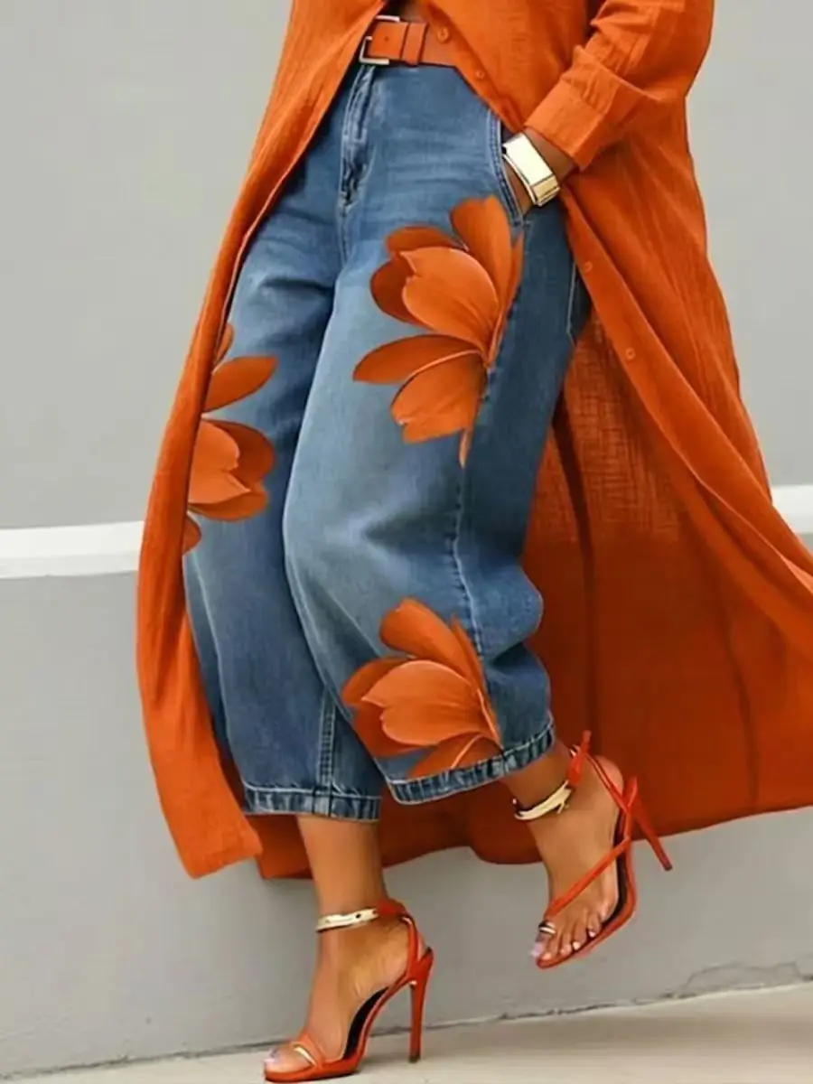 Jeansowe spodnie w kwiaty z szerokimi nogawkami — boho streetwear Pomarańczowy
