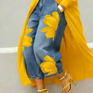 Jeansowe spodnie w kwiaty z szerokimi nogawkami — boho streetwear Żółty
