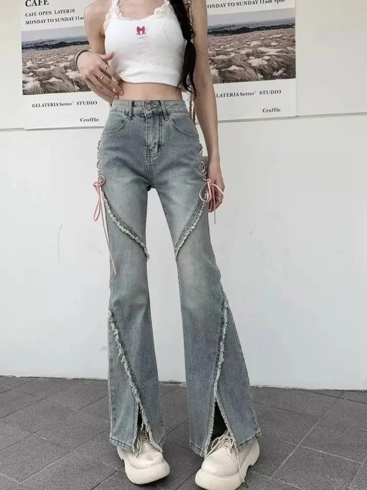 Jeansy damskie dzwony z rozcięciem retro Jasny niebieski