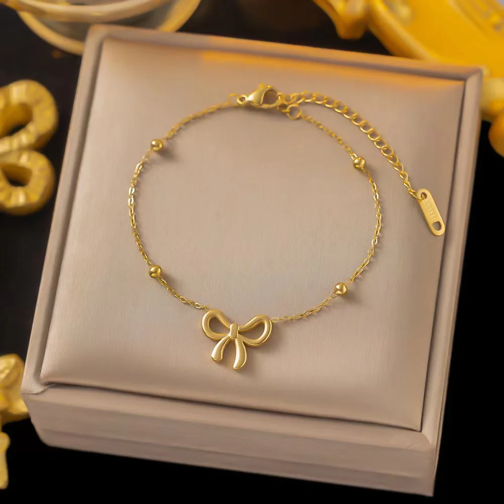 Komplet biżuterii ze stali szlachetnej z kokardką — naszyjnik, bransoletka, kolczyki Dg4243 bracelet
