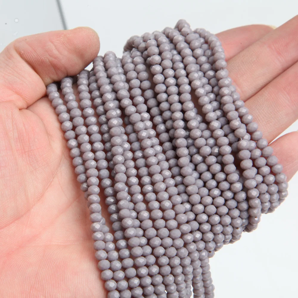 Kryształowe koraliki szklane Rondelle fasetowane AB 3x4 mm Jasnoszary