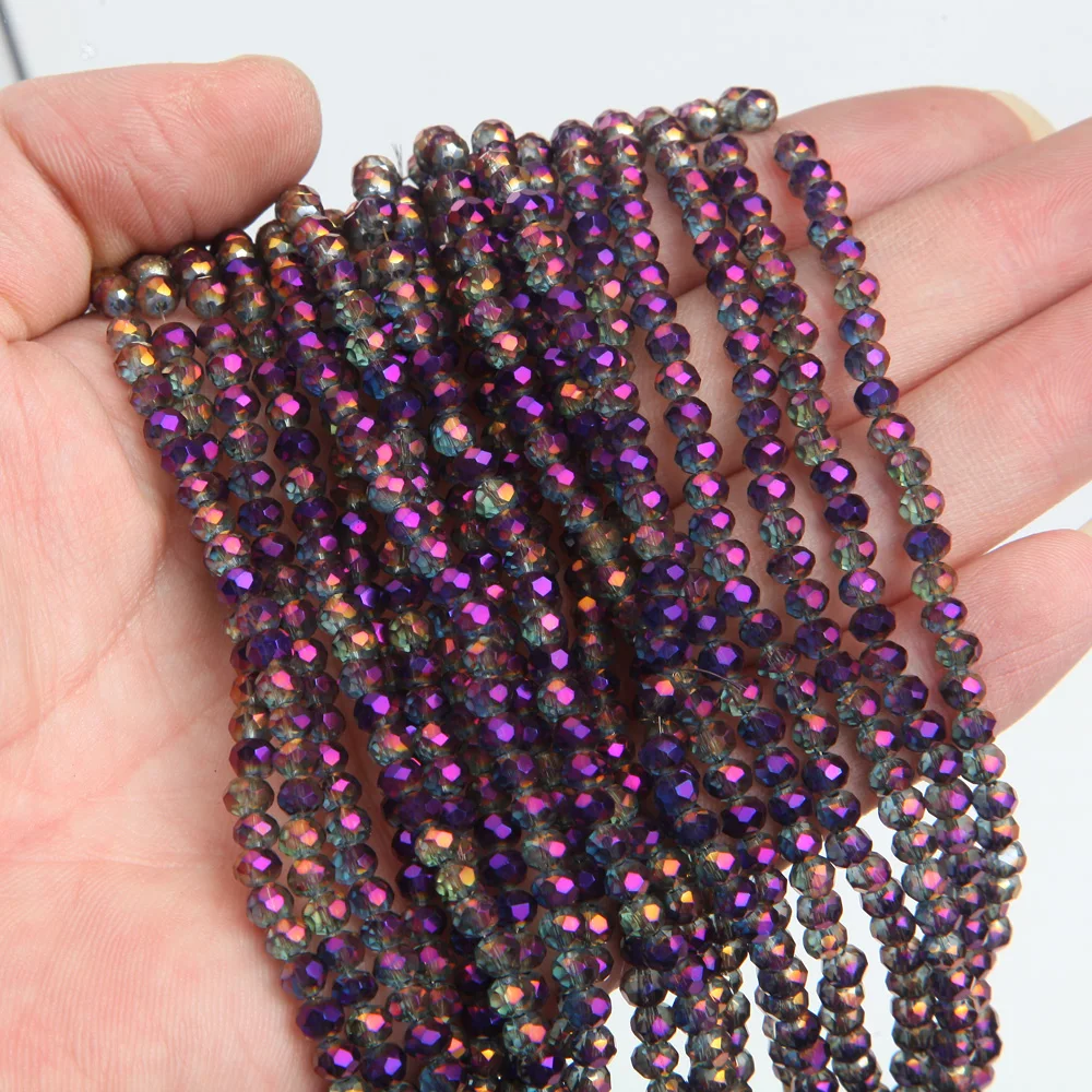 Kryształowe koraliki szklane Rondelle fasetowane AB 3x4 mm Szampan