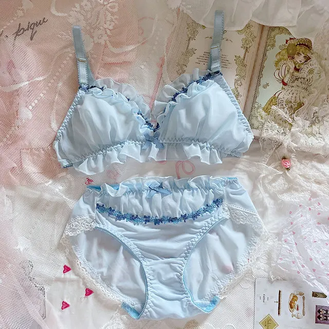 Koronkowy komplet bielizny push-up z kokardką i stringami 1