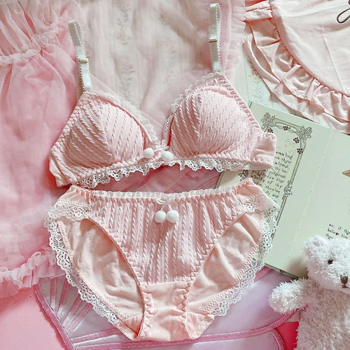 Koronkowy komplet bielizny push-up z kokardką i stringami 4