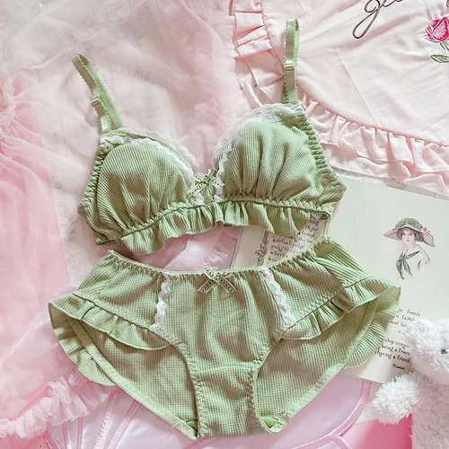 Koronkowy komplet bielizny push-up z kokardką i stringami 6