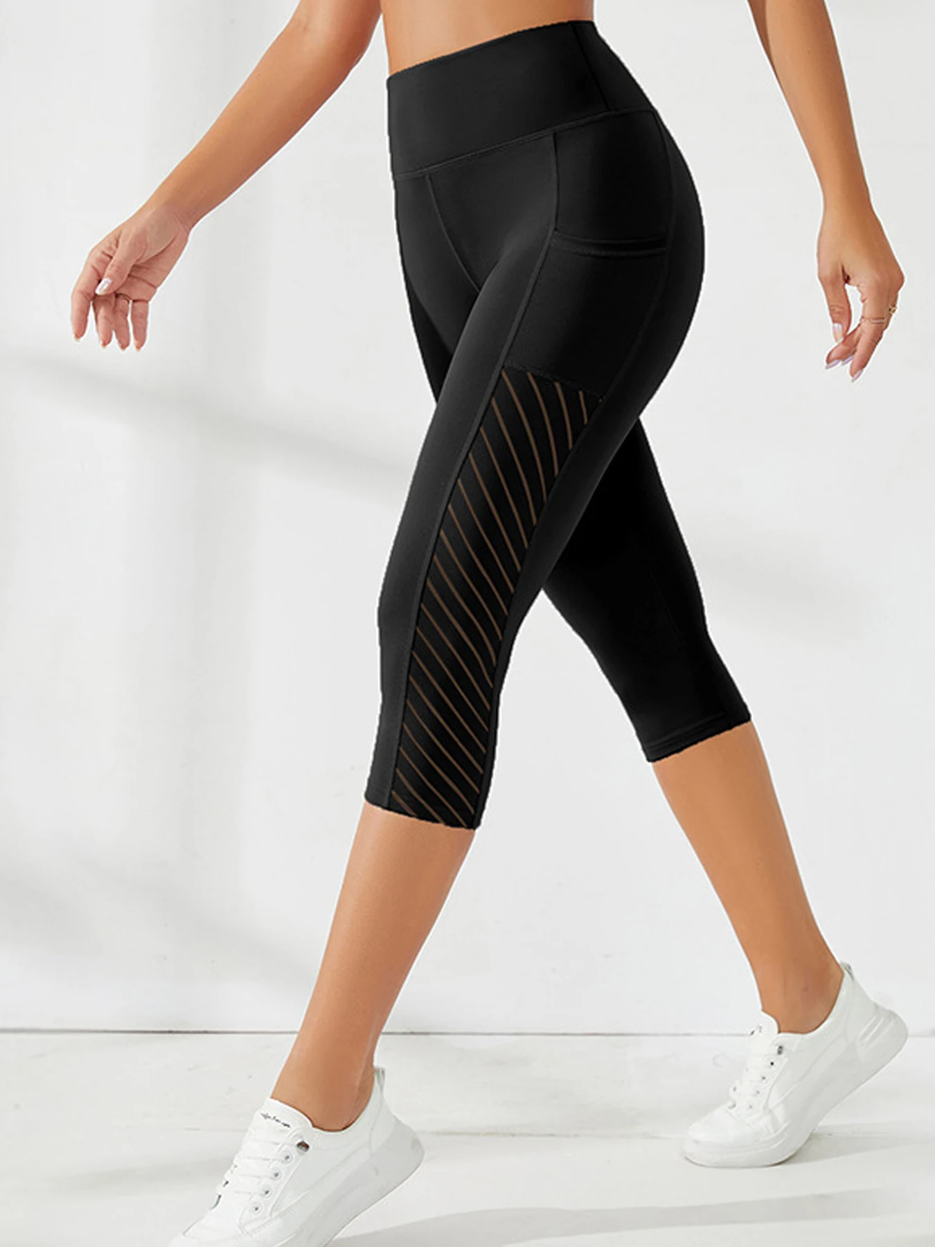 Legginsy do jogi 3/4 z kieszeniami boczymi wyszczuplające brzuch Czarny
