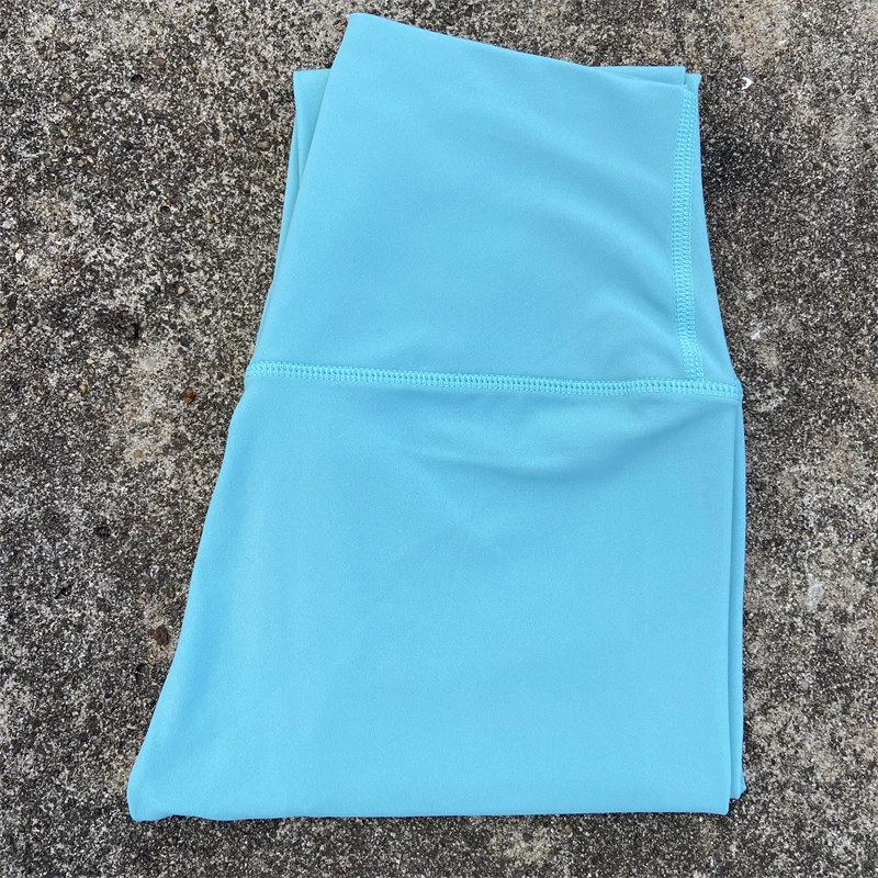 Legginsy sportowe z kieszeniami plus size do biegania i fitnessu Brzoskwiniowy rumieniec