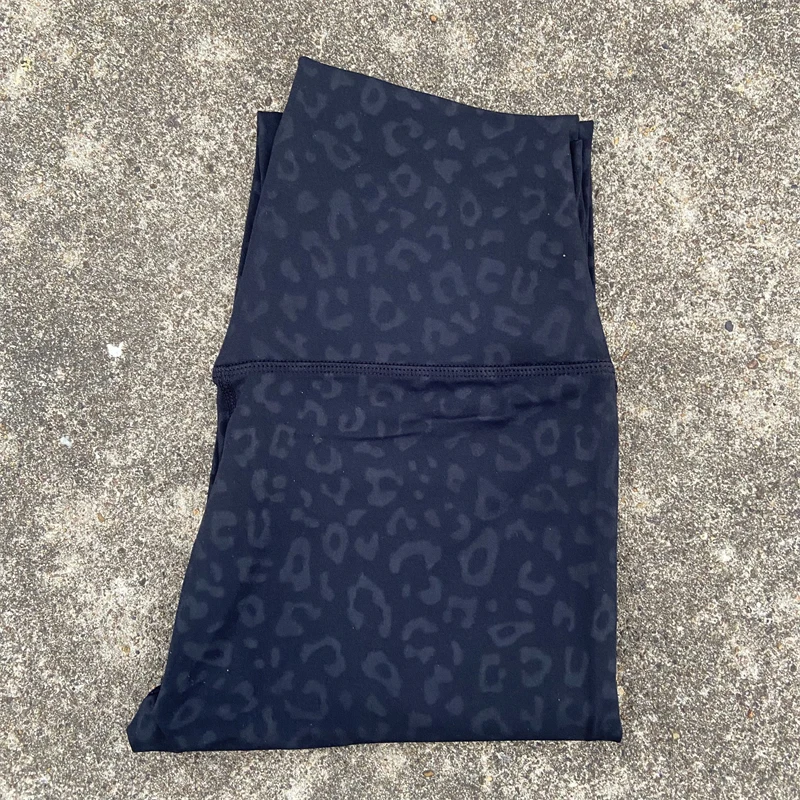 Legginsy sportowe z kieszeniami plus size do biegania i fitnessu Czarny