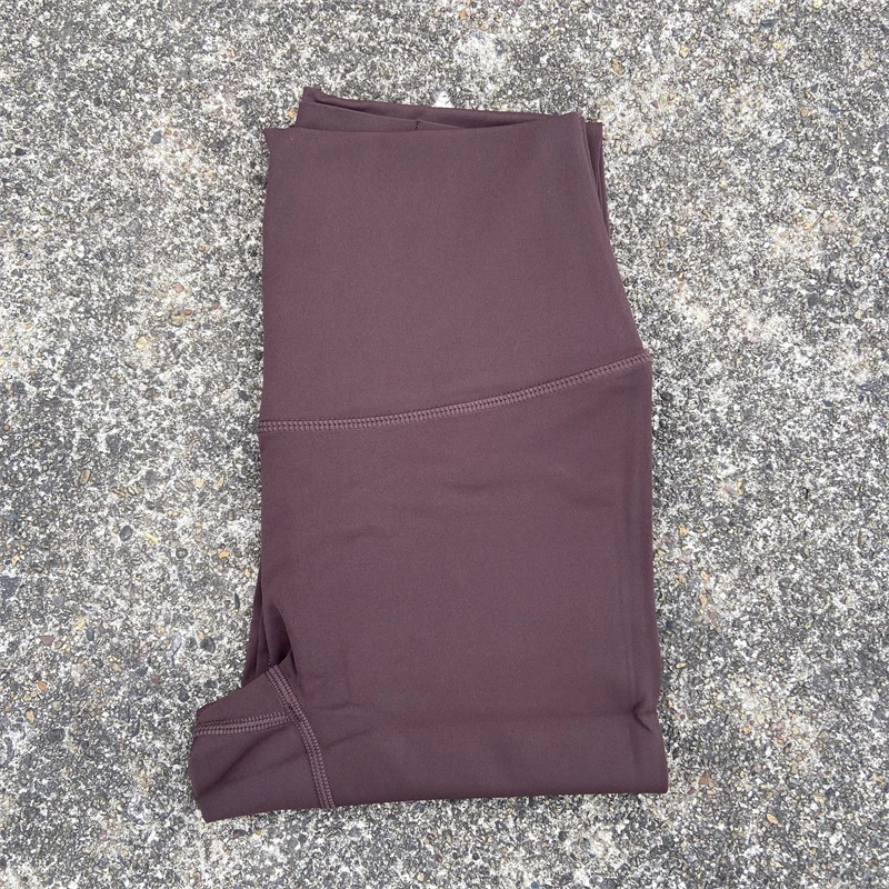 Legginsy sportowe z kieszeniami plus size do biegania i fitnessu Szara gołczyna