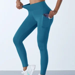 Legginsy sportowe push-up z kieszeniami — wysoki stan i idealny krój do jogi Morski