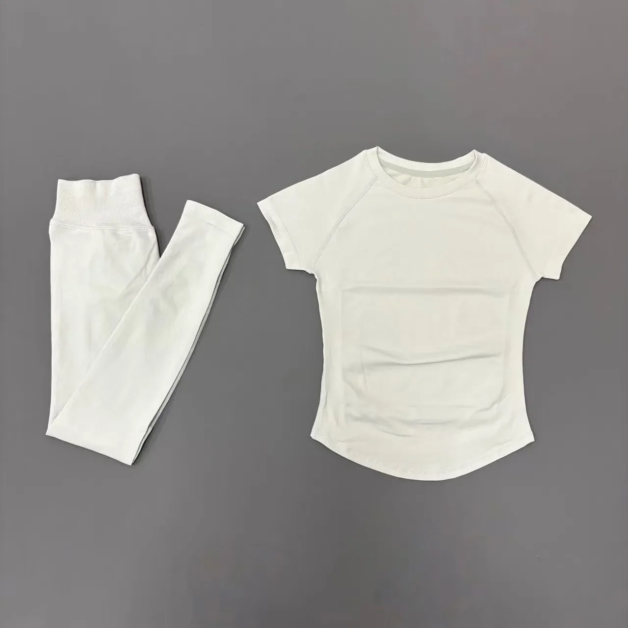 Dwuczęściowy letni komplet damski: T-shirt i spodnie z wysokim stanem Ciemny niebieski