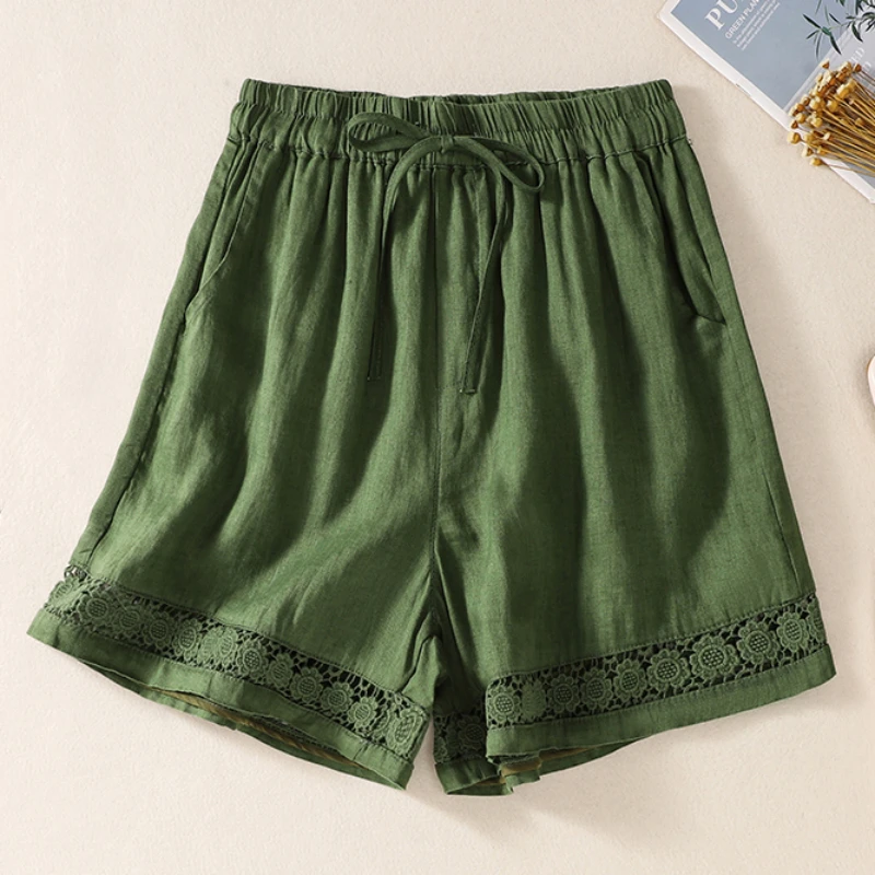 Lniane szorty boho z gumką w pasie i koronką Zielony