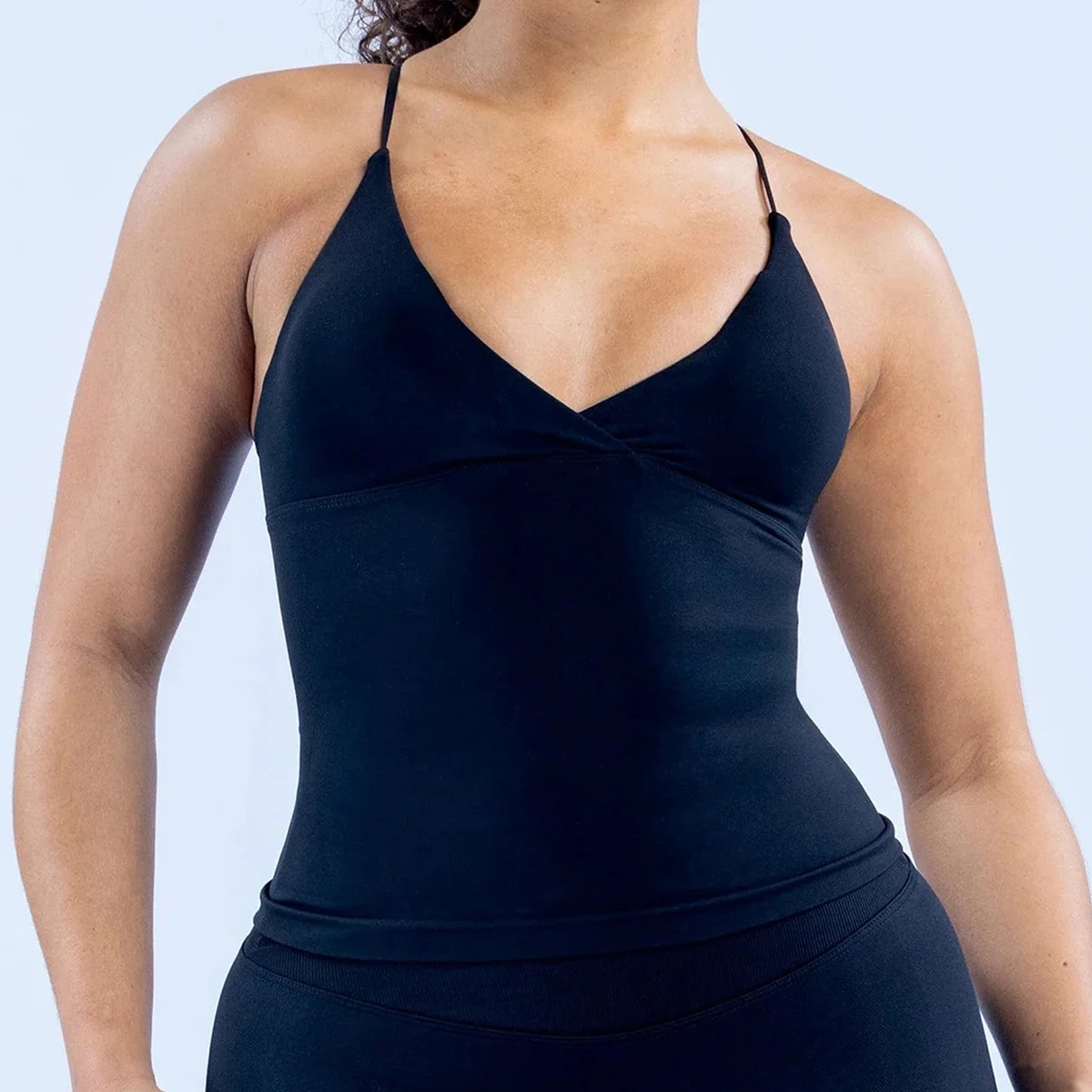 Longline top sportowy z odkrytymi plecami Twist Front do jogi Niebieski