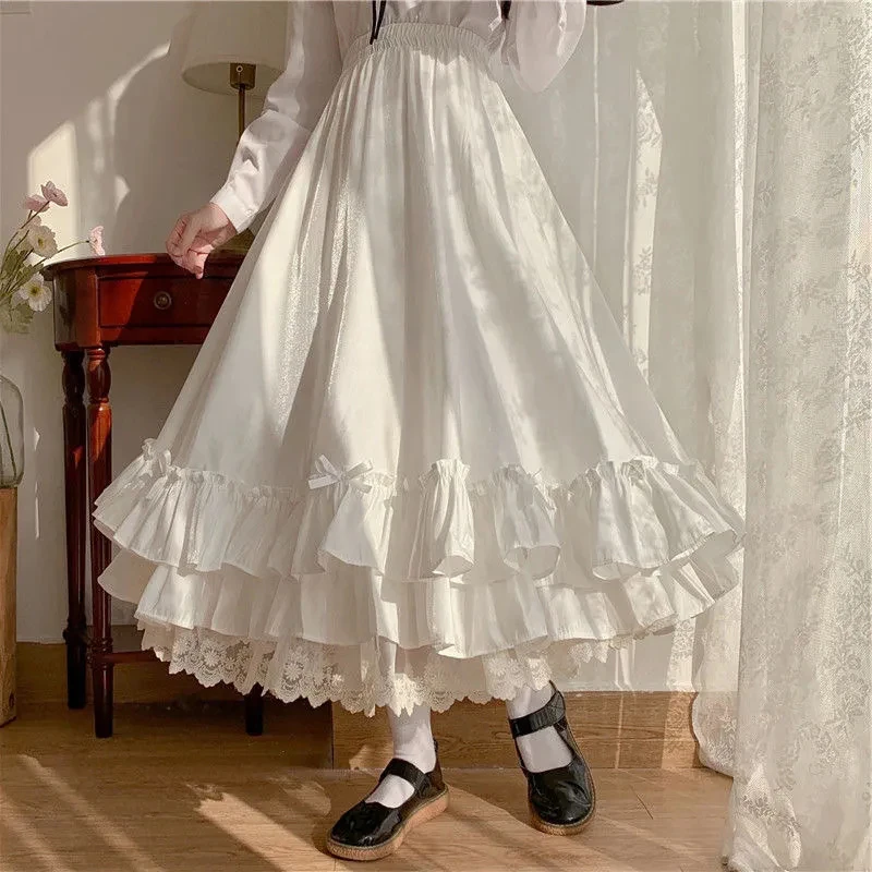 Midi spódnica damska z koronką i kokardą — styl preppy Biały