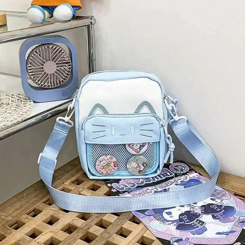 Mini torebka Ita Bag kot Y2K crossbody Niebieski