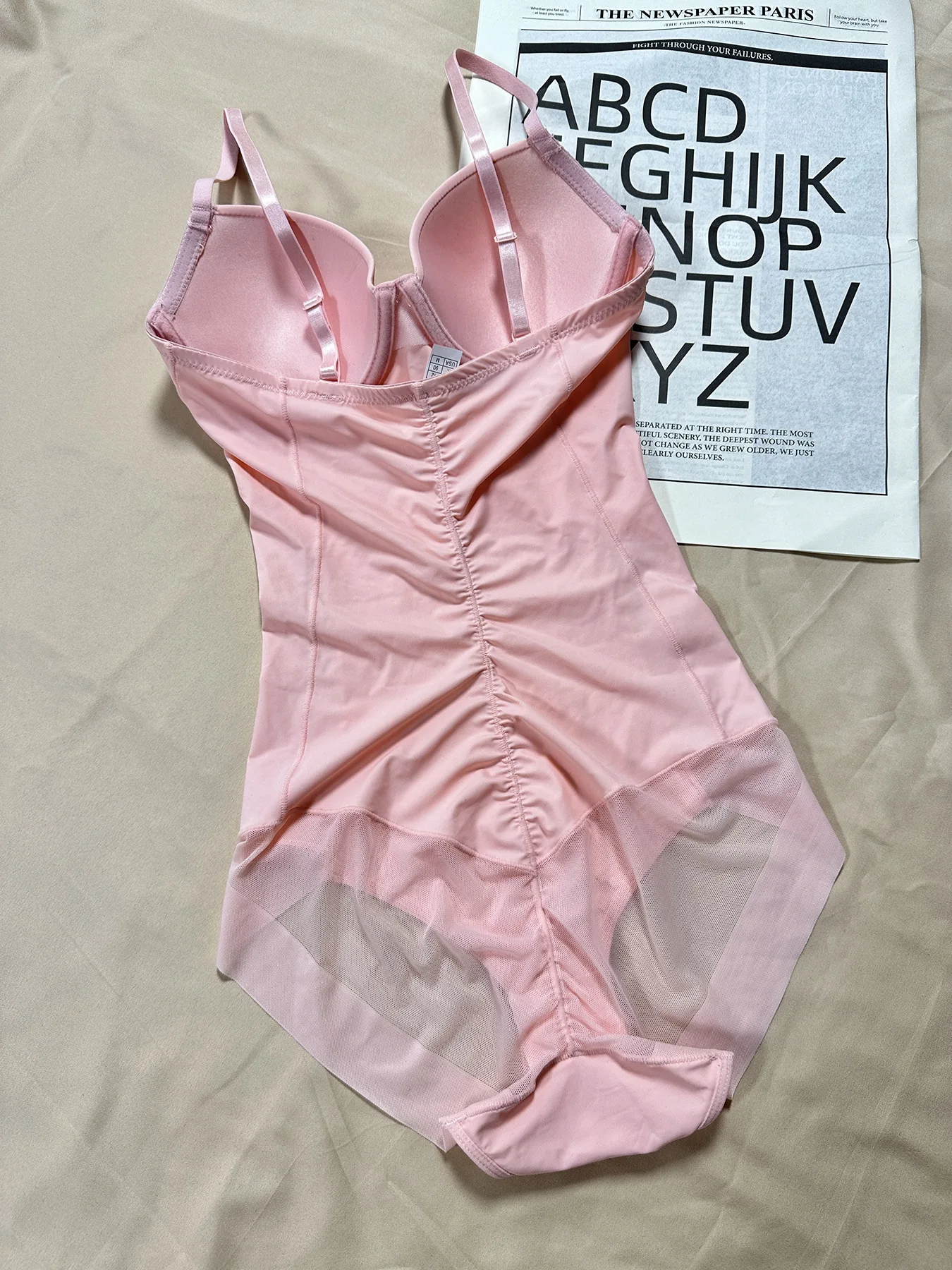 Modelujące body damskie z asymetrycznym zamkiem Różowy
