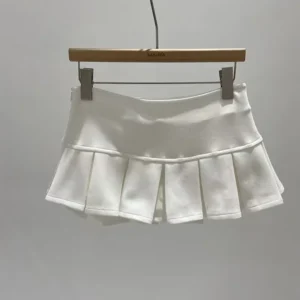 Obcisła mini spódniczka z zamkiem — elegancki wieczorowy look Biały