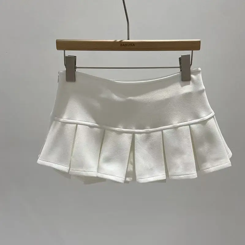 Obcisła mini spódniczka z zamkiem — elegancki wieczorowy look Biały