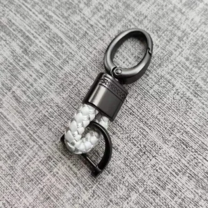 Ręcznie tkany skórzany breloczek do kluczyków — elegancki unisex Niebieski